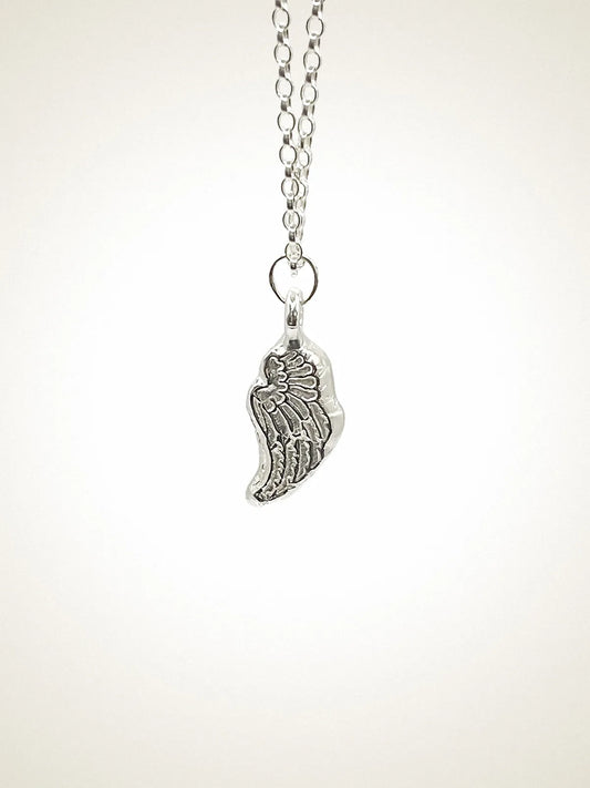 Handcrafted Angel Wing Necklace in Sterling silver, artisan jewelry, elegant design