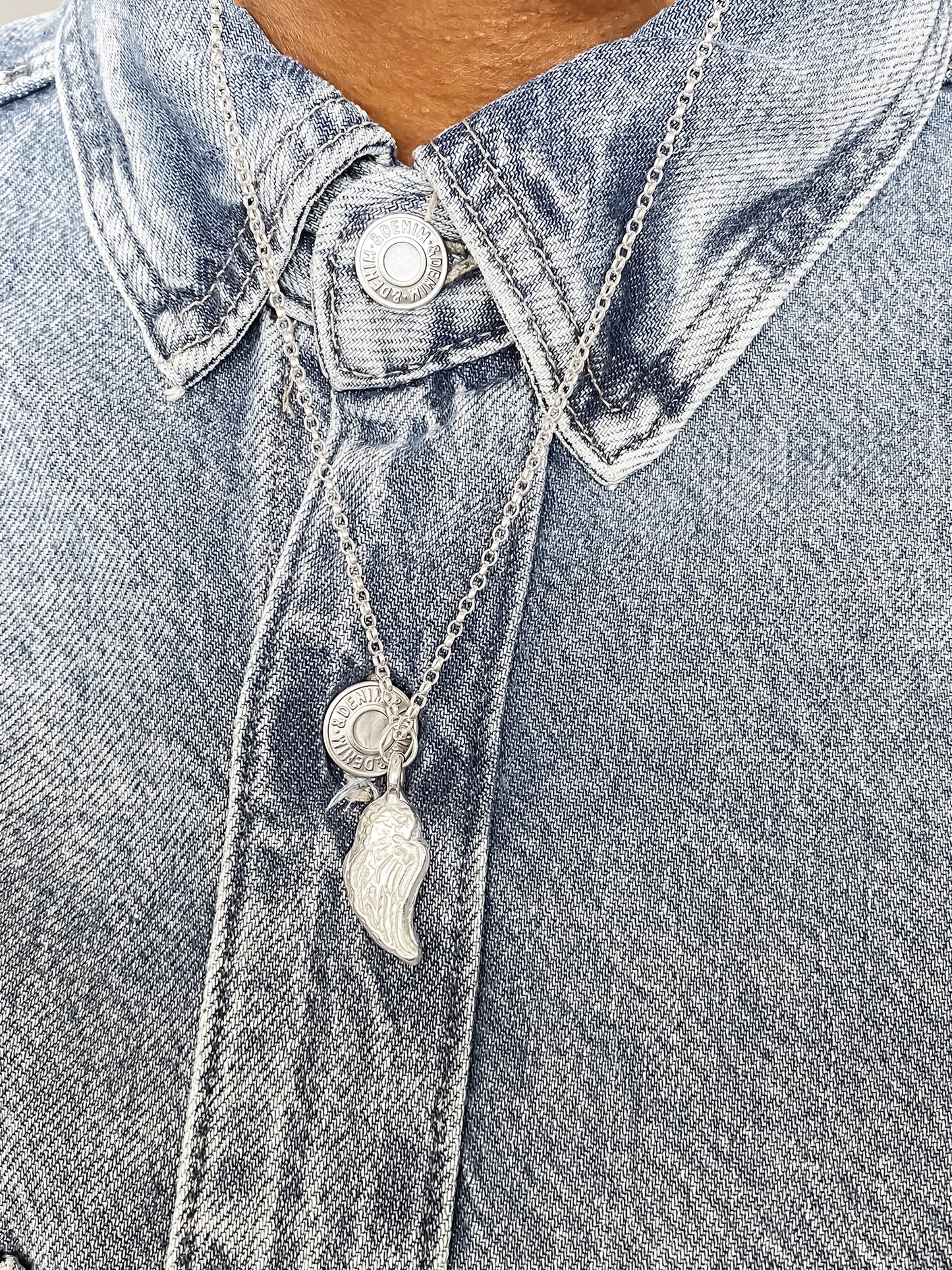 Angel Wing Pendant on denim background, guardian 11:11 gold or silver free shipping