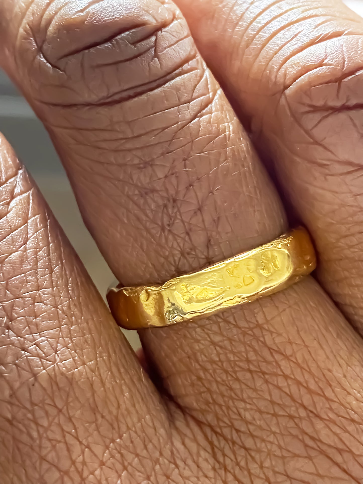 Handmade Darling Textured Band Ring in gold, featuring a delicate hammered finish. Minimal design by MOCA Jewellery.