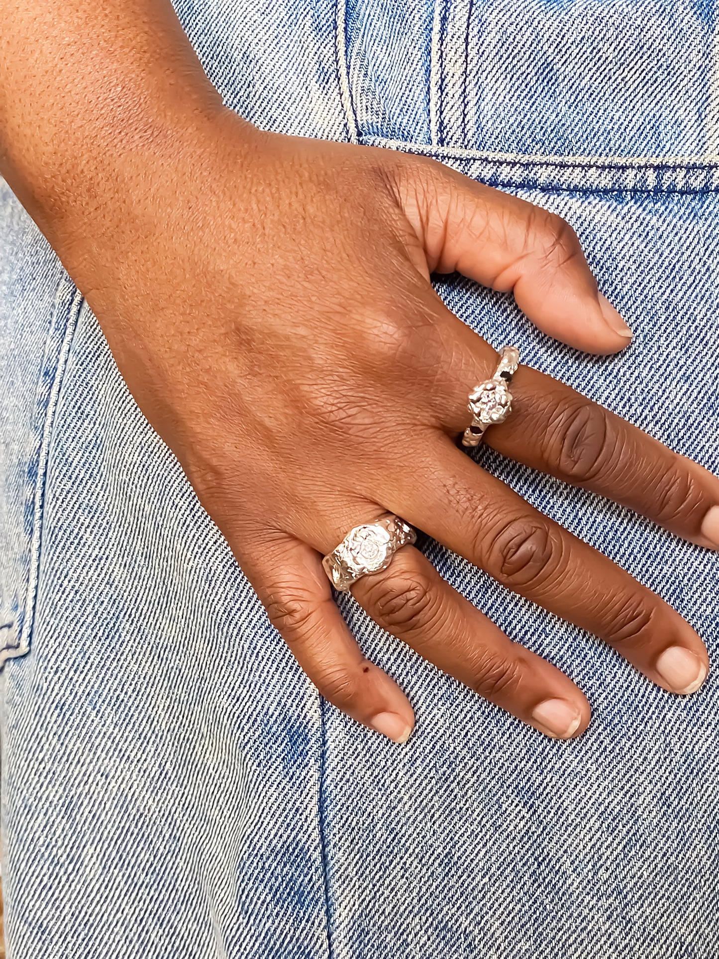 Blue background hand modelled with Eclipse Cutout Ring - textured band white and black gemstones gold or silver free shipping