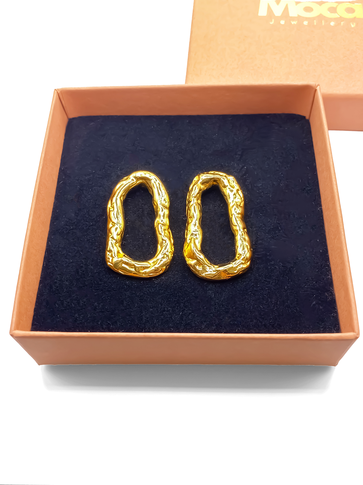 Handmade Flow Loop Earrings in gold with a textured finish, statement design by MOCA Jewellery. Sleek, delicate, minimal style for modern wear.