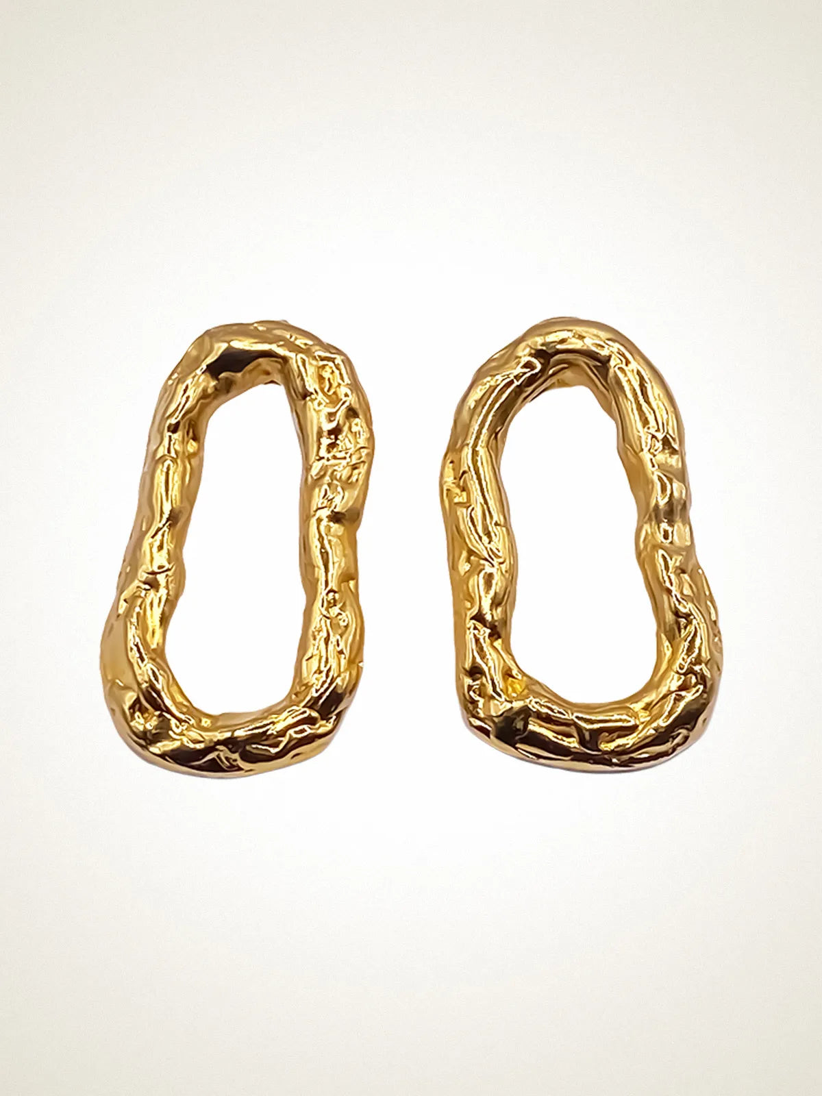 Premium Flow Loop Earrings handmade in premium metal, classic design, worn view