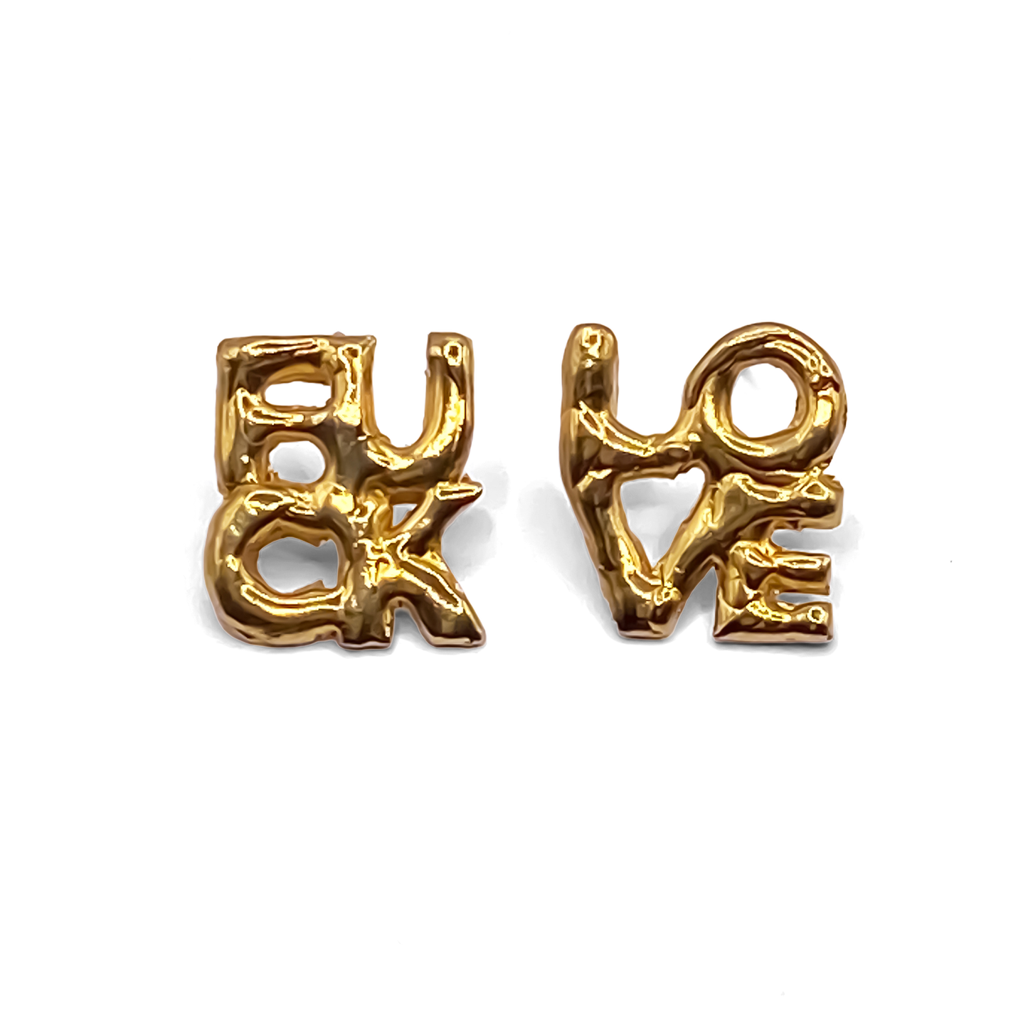 Flatlay of gold FUCK LOVE Earrings – minimal and bold cheeky studs by MOCA Jewellery