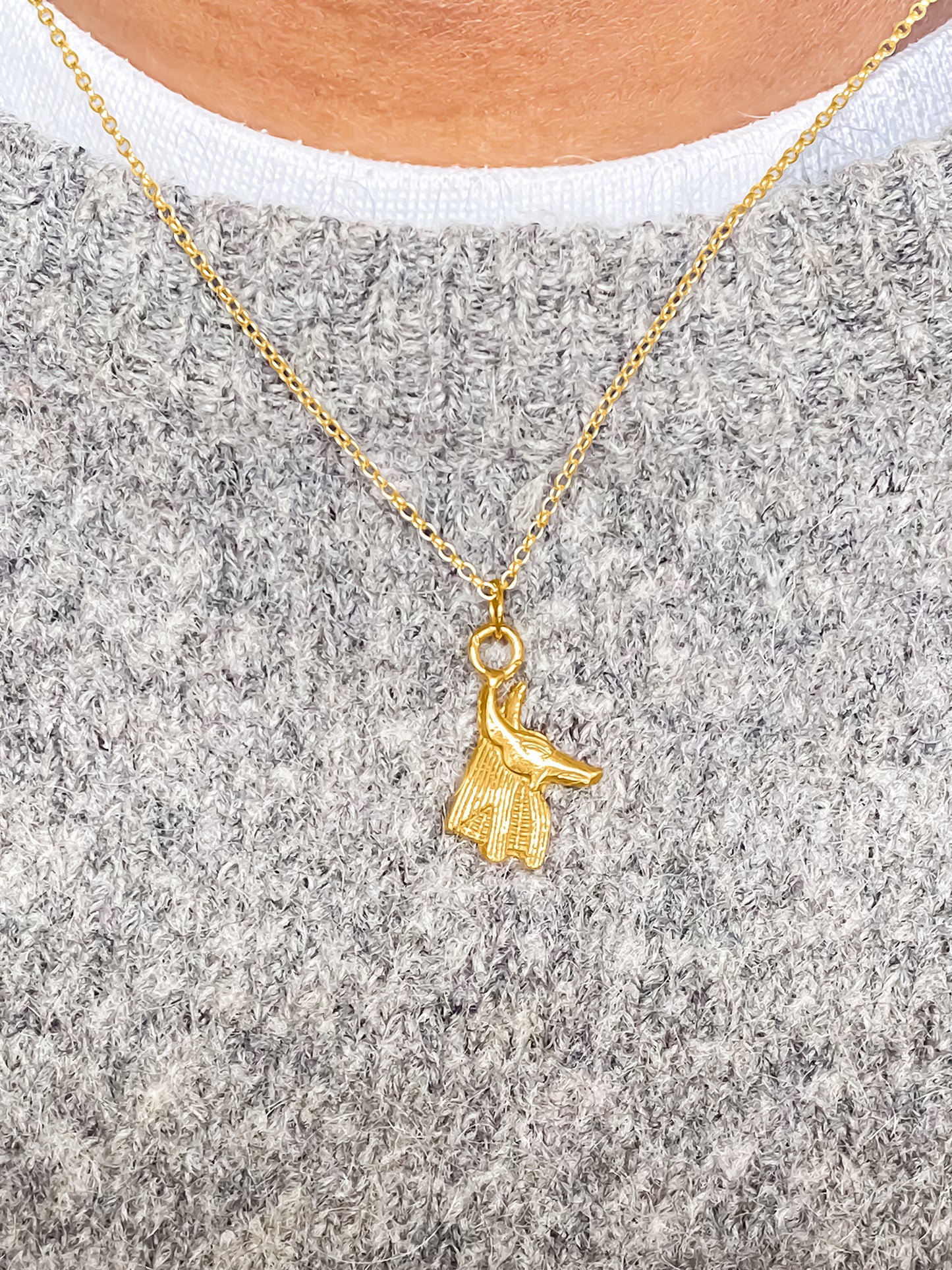 Close shot of Anubis gold necklace mystical African design, handmade MOCA Jewellery