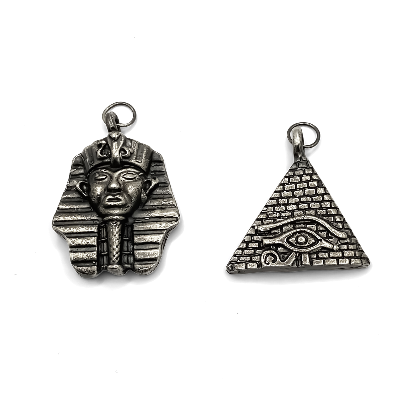 Group image of Horus Eye Pyramid and Pharaoh Pendants in oxidised gold or silver with free UK shipping