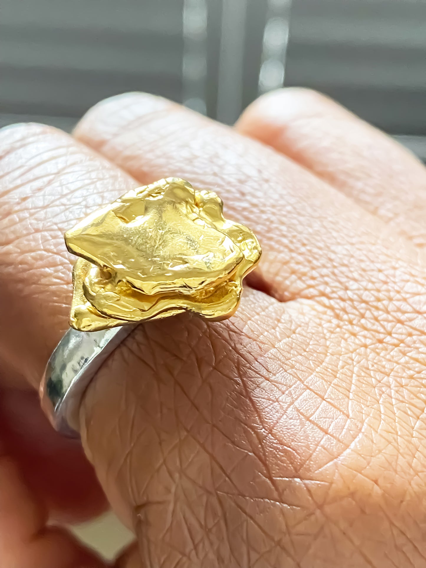 Handcrafted flower ring with an abstract shape, in gold on silver band, by MOCA Jewellery, free UK shipping