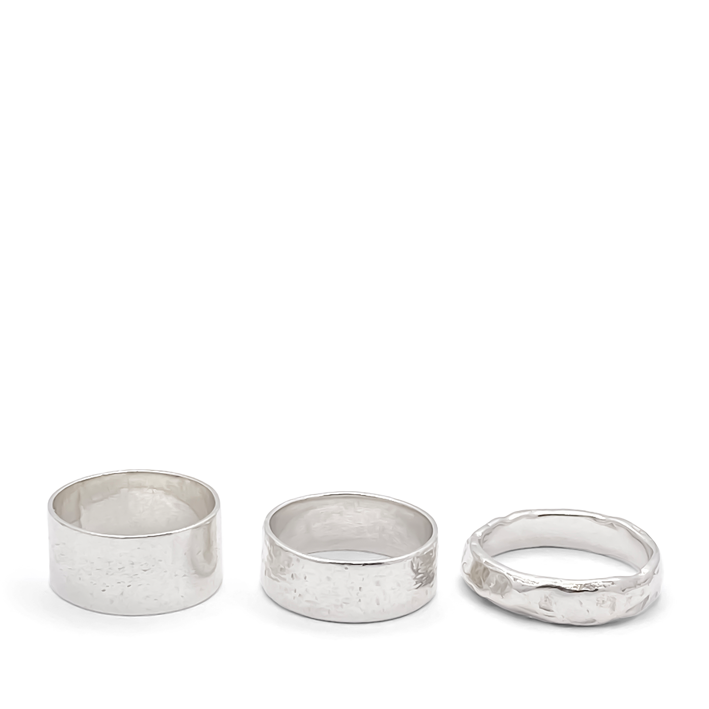 May's Ring with hammered texture, understated and minimal in gold or silver, featuring free shipping options