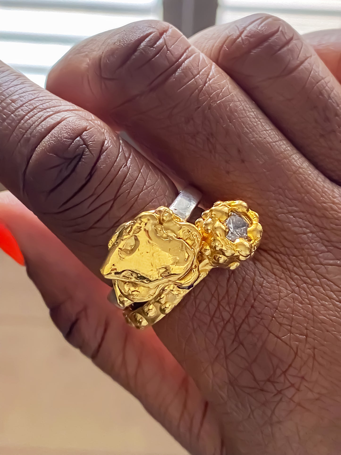 Gold ring set with sculptural embellishment and crystals, unique design from MOCA Jewellery.