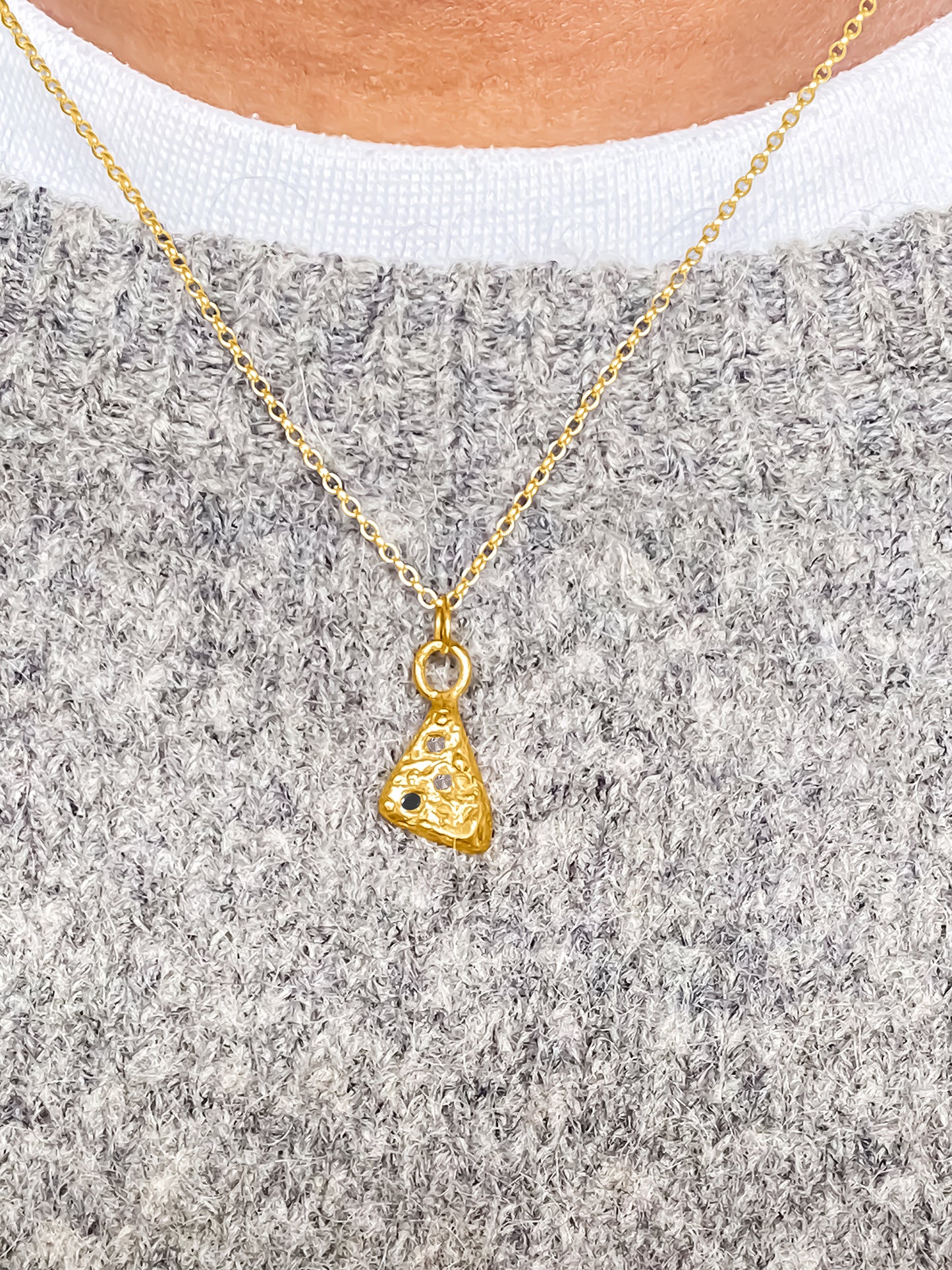 MOCA Jewellery’s Triad Spark Pendant in gold with subtle gemstone accents, handmade and minimal