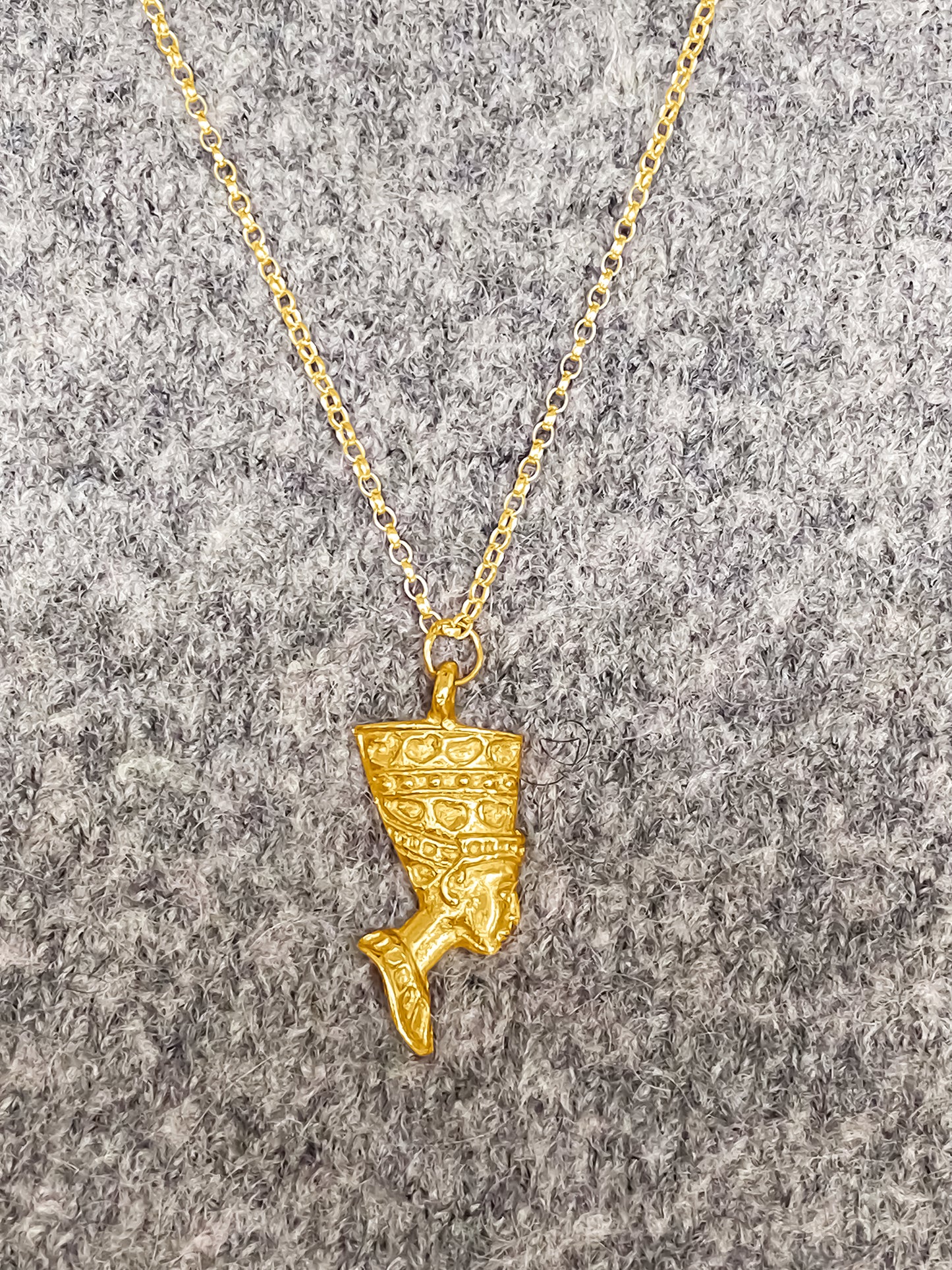 Iconic Nefertiti profile pendant in gold, celebrating the queen’s legacy with craftsmanship and grace MOCA Jewellery