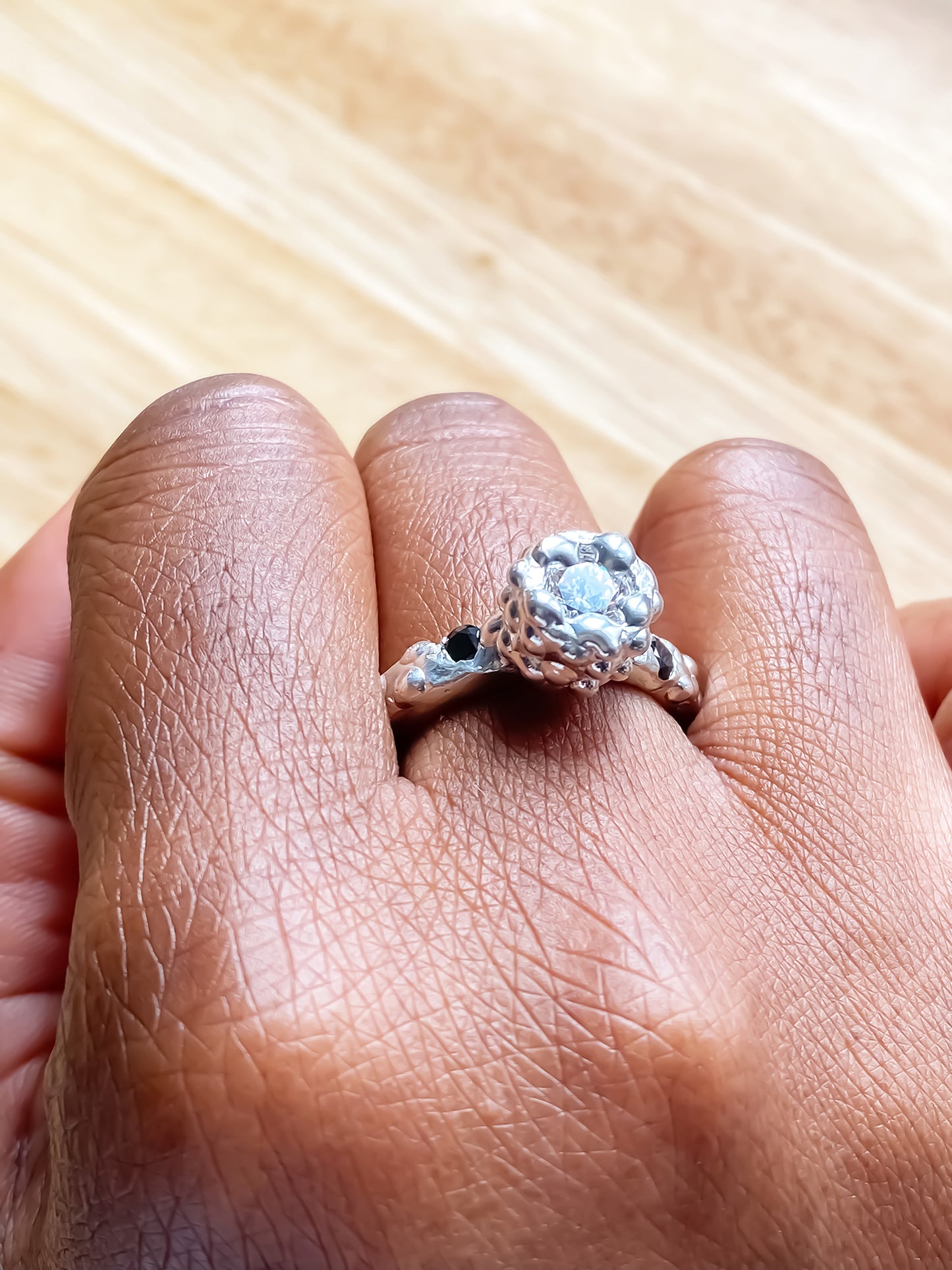 Orbit Ring worn on light-skinned hand in profile - abstract, bold white and black gemstones gold or silver free shipping