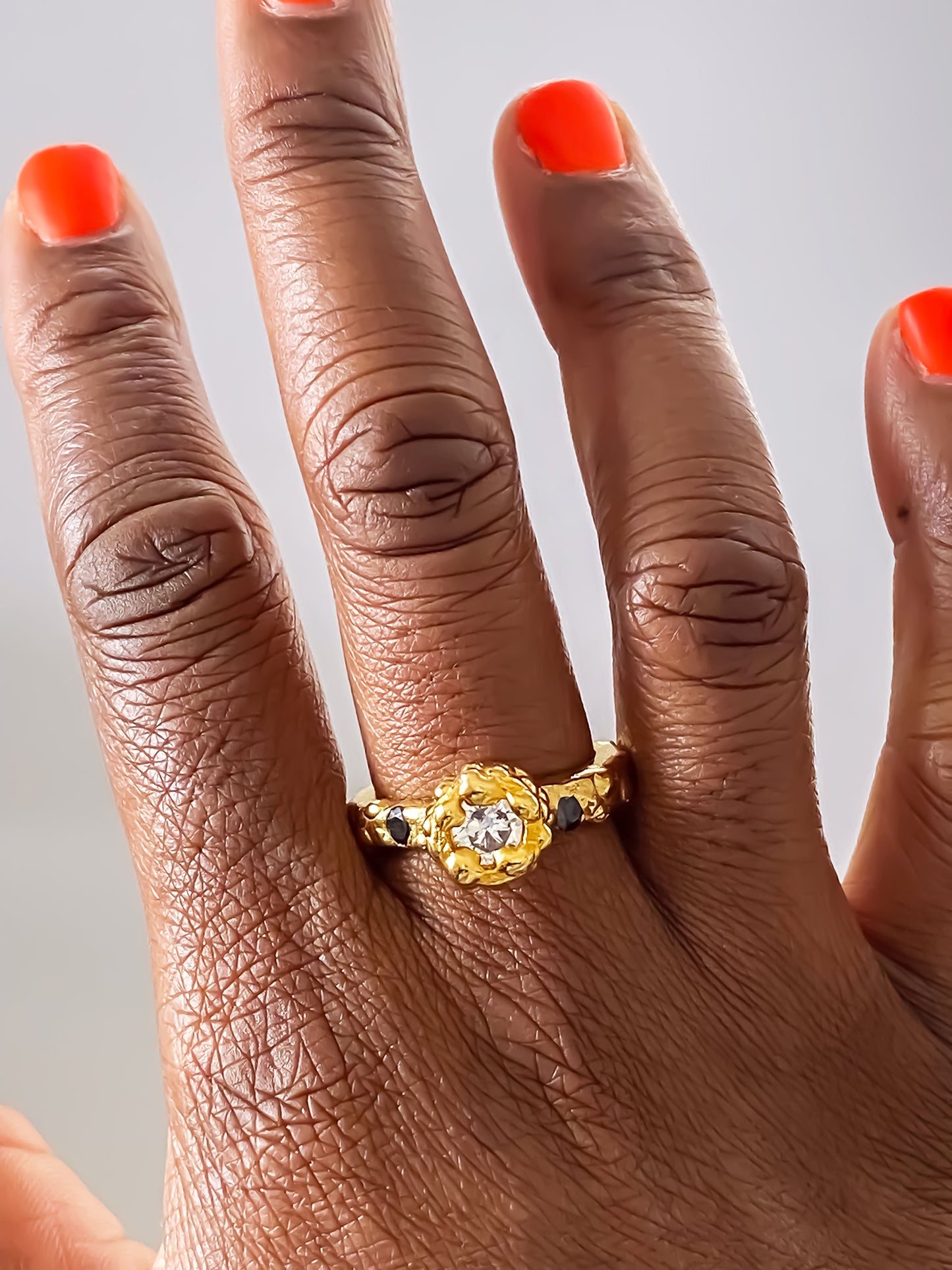 MOCA Jewellery Orbit Ring in gold with abstract design, white centre gem and dotted detailing