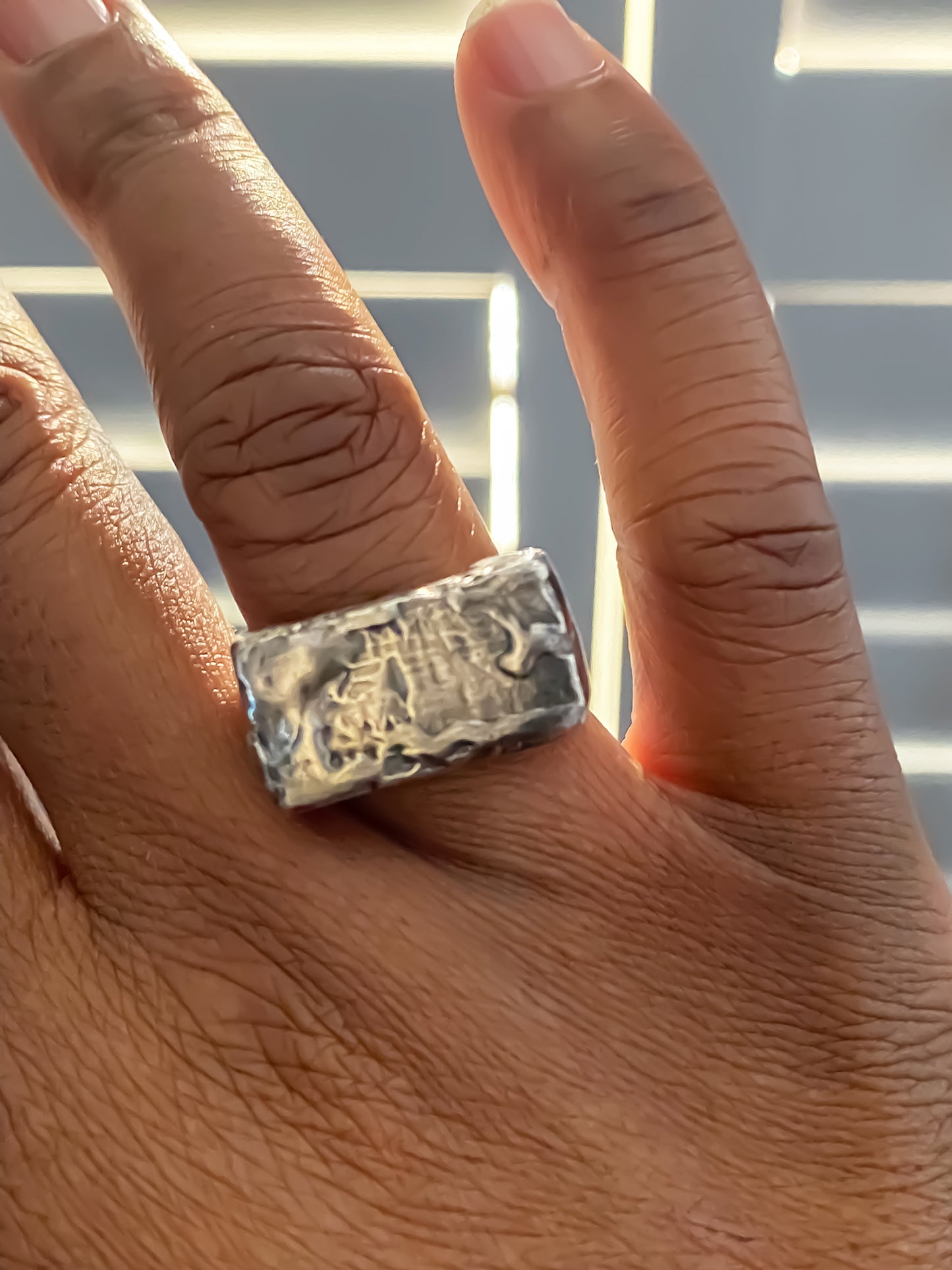 Rippled Signet Ring in oxidised textured gold or silver with free shipping, worn on a hand