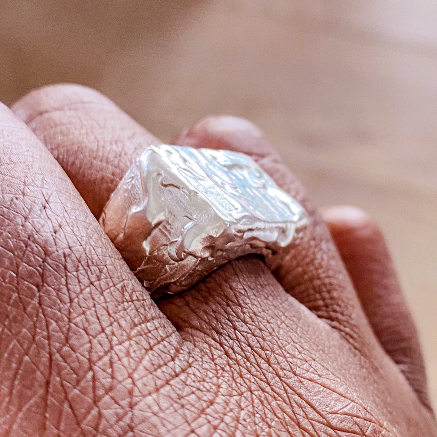 Moca Jewellery Rosa Signet Ring bubble texture playful gold or silver free shipping displayed on a hand