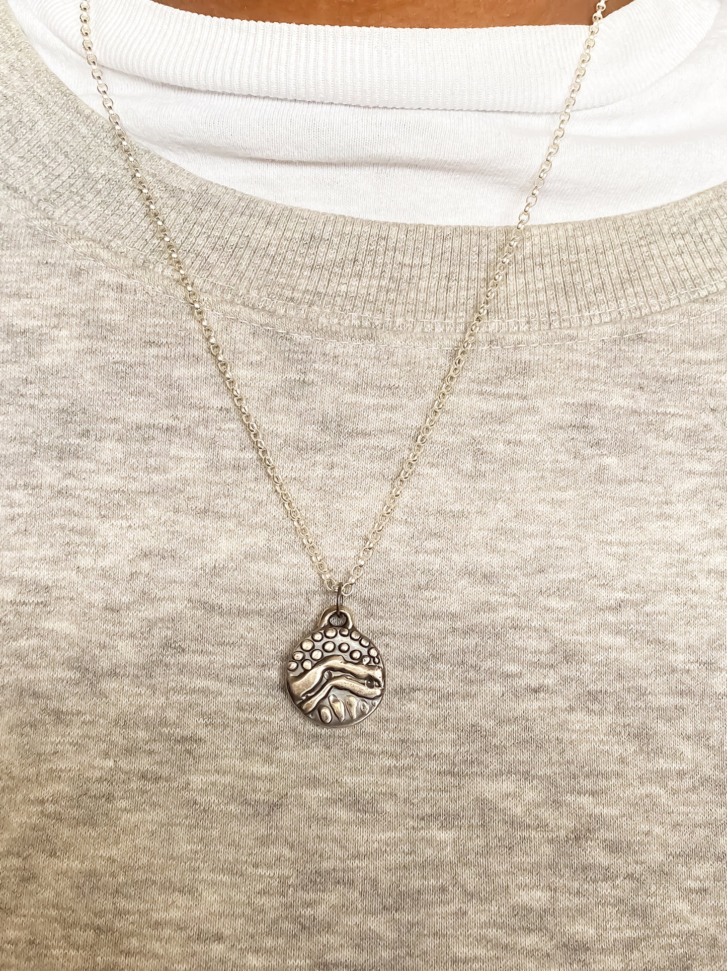 Round Dotty Pendant worn on chest for minimal styling - textured, happy buddha, oxidised organic texture gold or silver free shipping