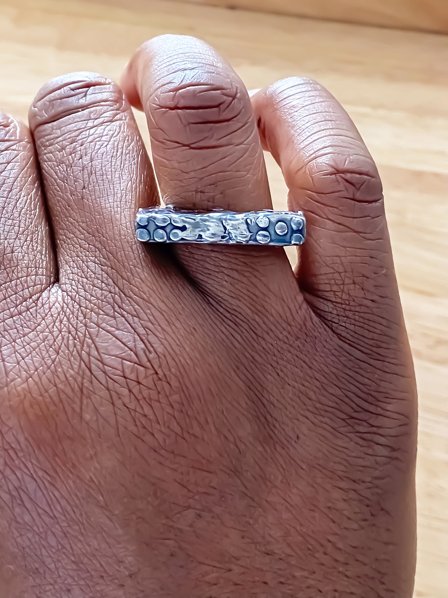 Slender unique Textured Ring oxidised gold or silver with free shipping displayed on a hand