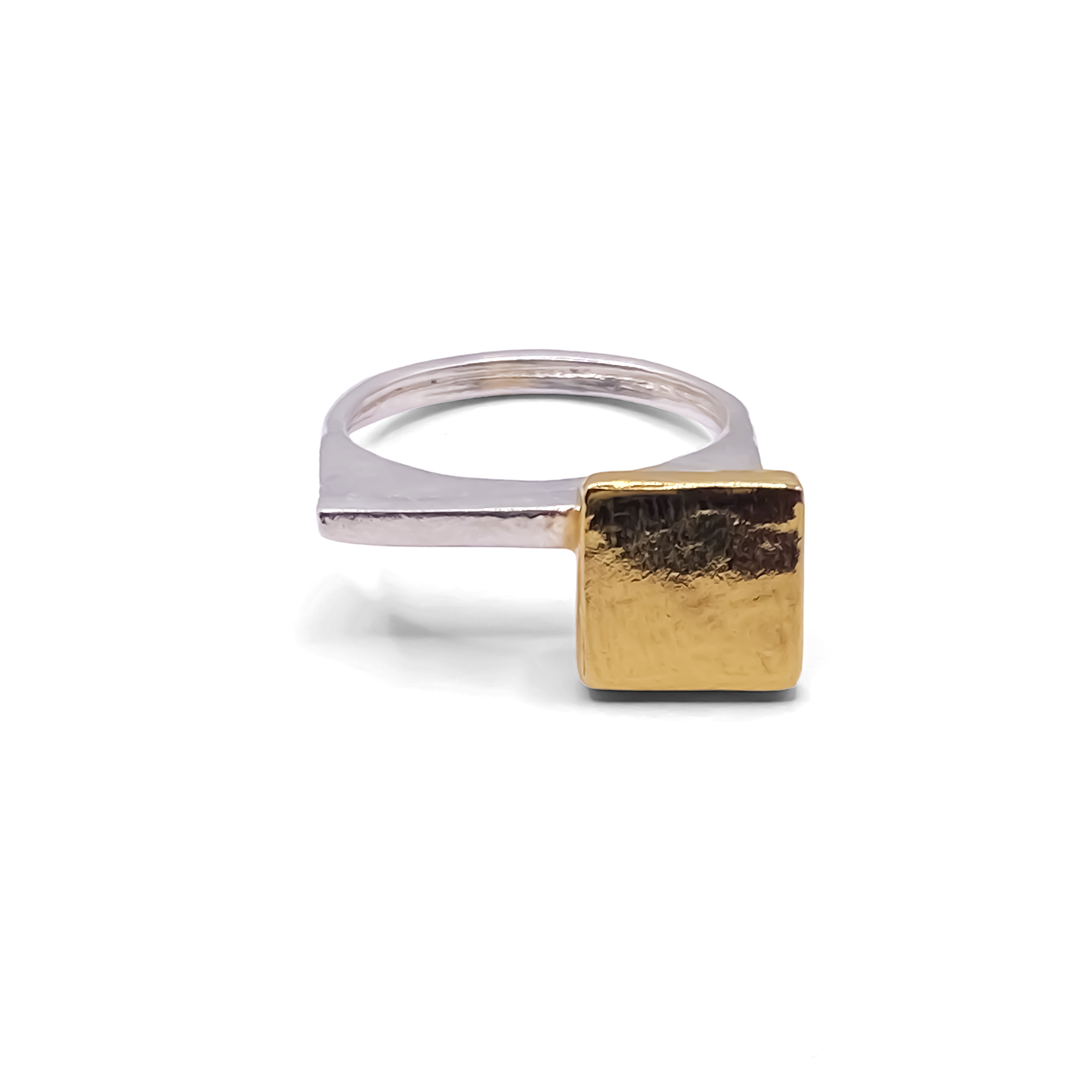 Silver ring with gold square top on white background, MOCA Jewellery piece
