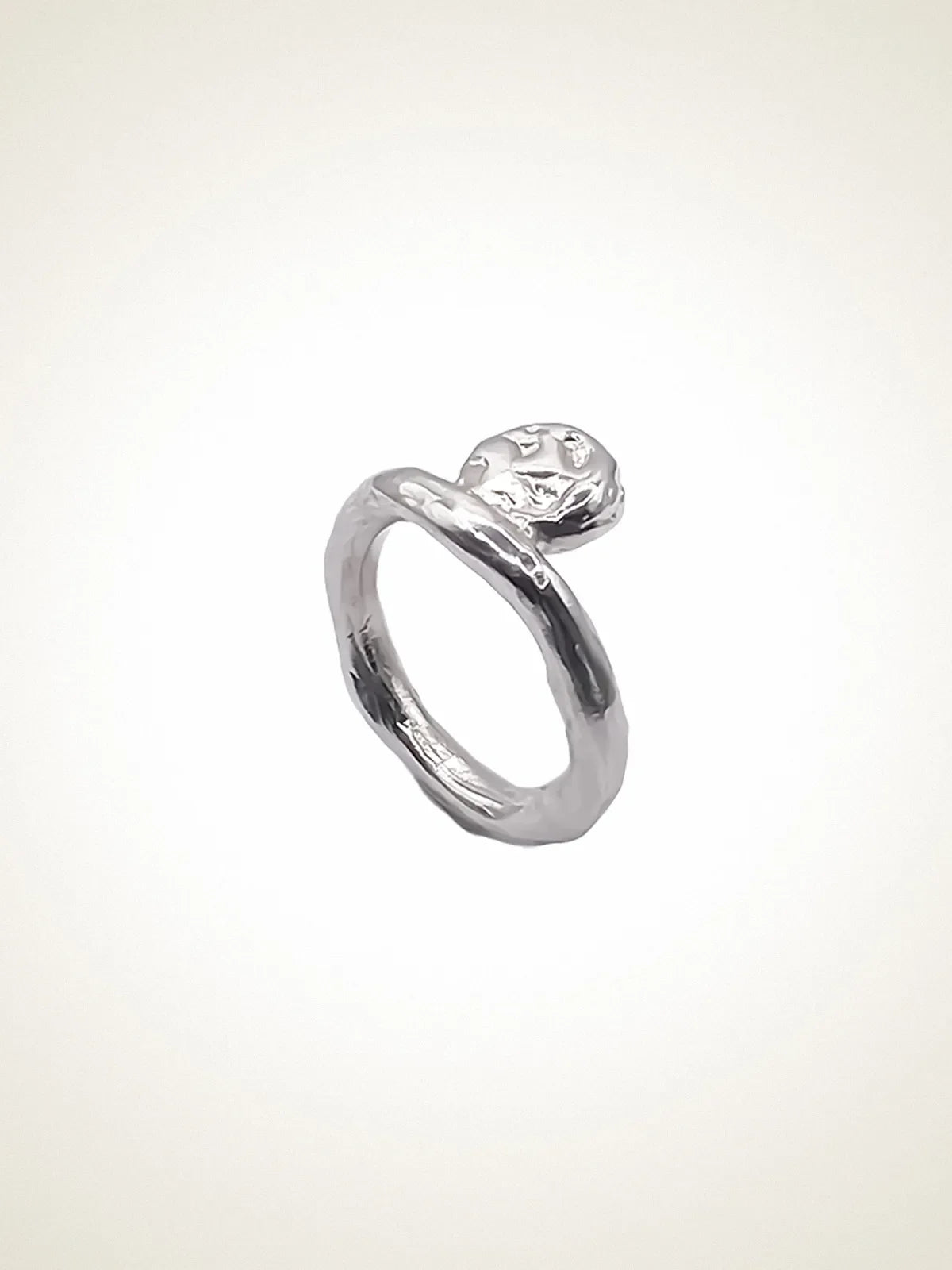 Artisan Circle Accent Ring in premium premium metal, refined finish, angle view