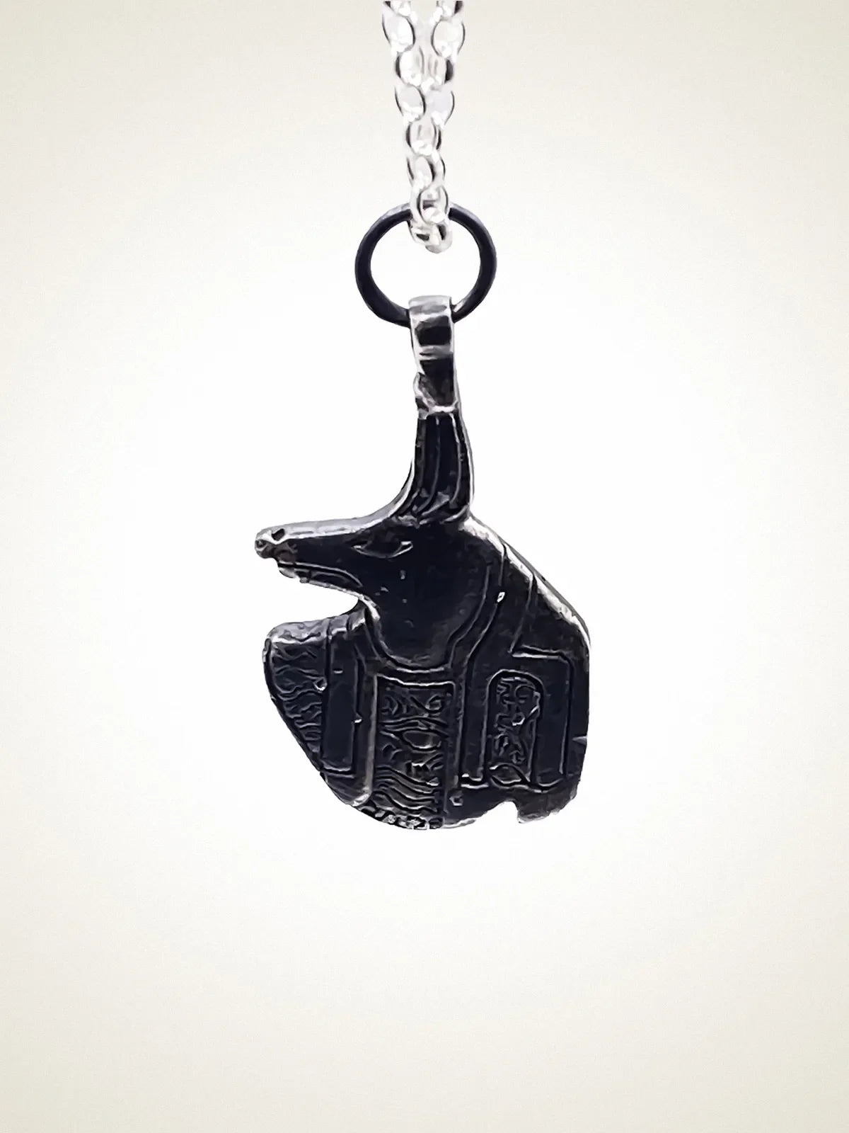 Anubis - the jackal-headed god artisan crafted necklace in premium metal, timeless style, lifestyle shot