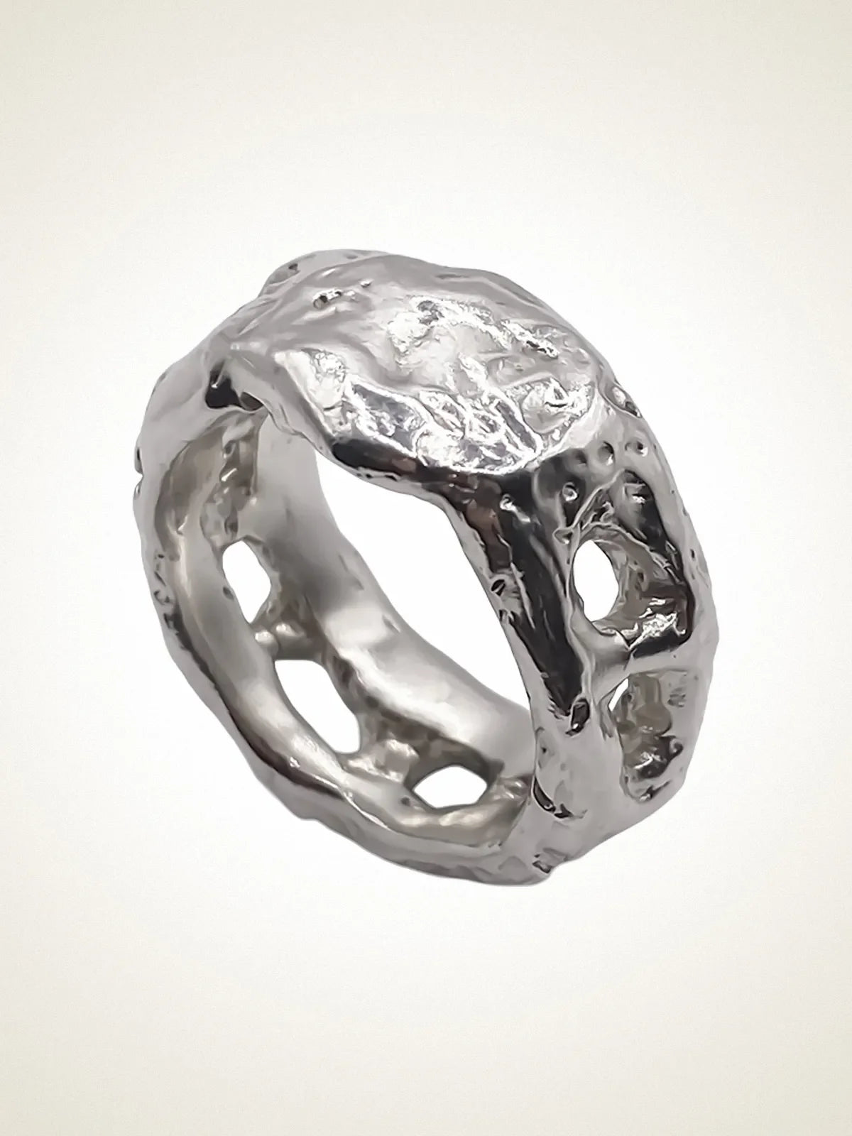 Artisan Eclipse Cutout Ring in premium premium metal, refined finish, angle view