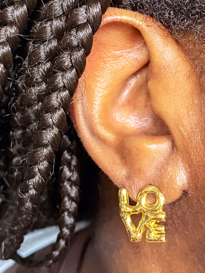 LOVE letter earring in gold with a minimal textured design – statement piece from MOCA Jewellery