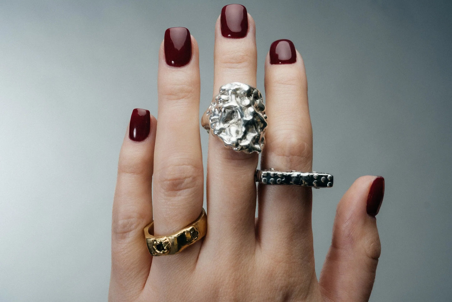 Artisan Wonky Nut Ring in premium Gold Black & Green Gemstone, refined finish, angle view