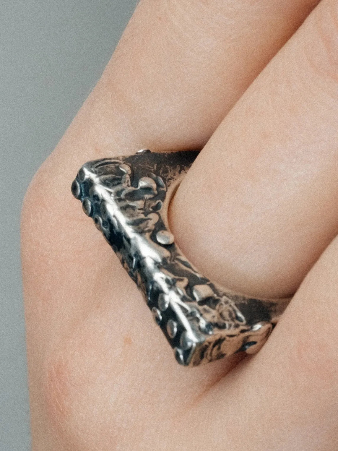 Artisan Slender Textured Ring in premium Patina, refined finish, angle view