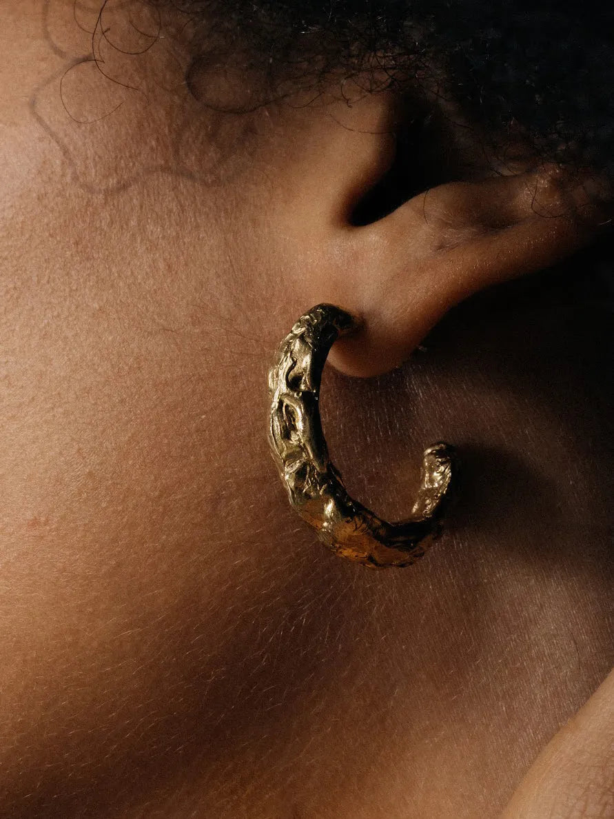 Artisan Hoop Earrings in premium premium metal, refined finish, angle view