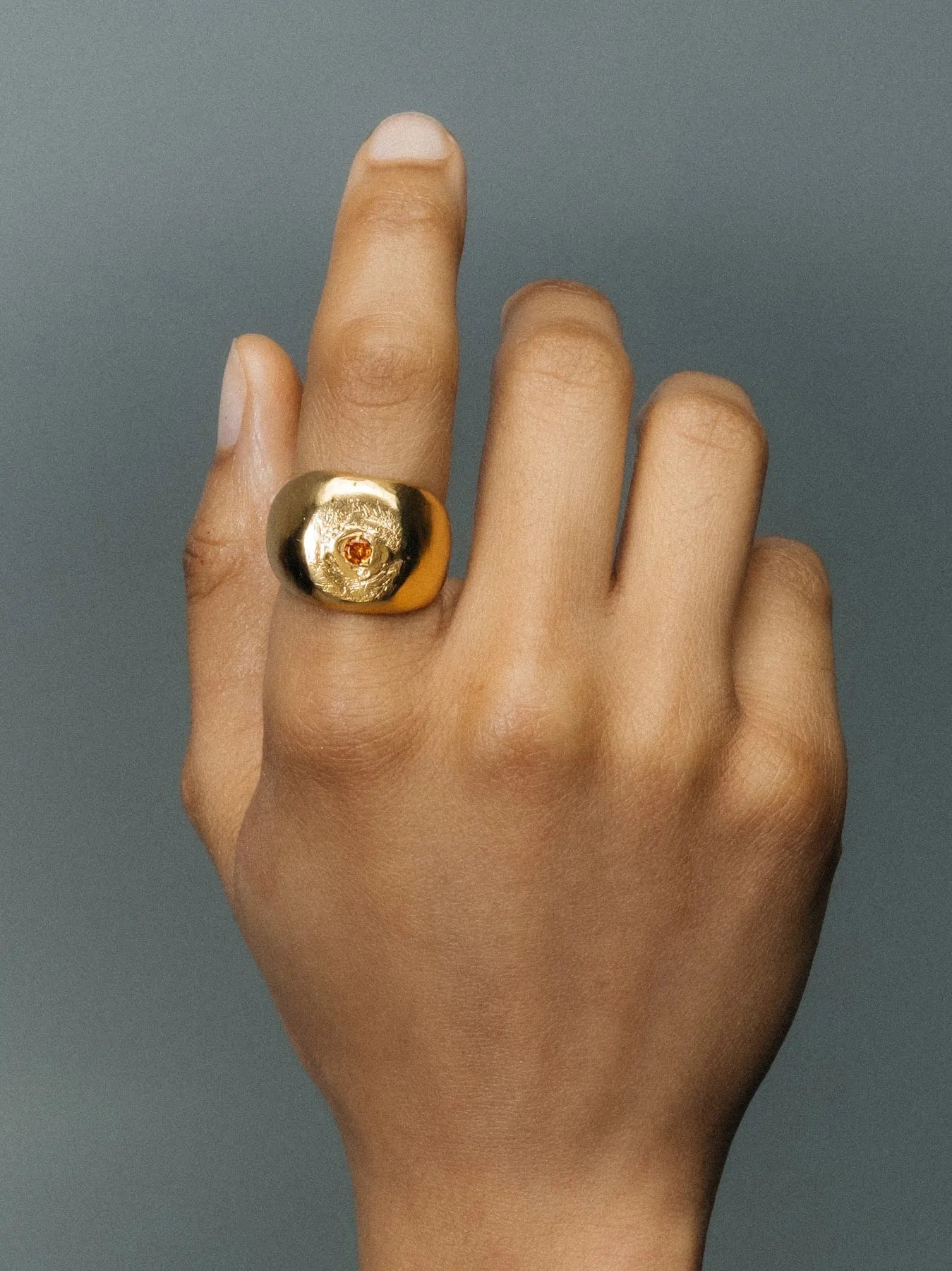 Artisan Round Signet Gem Ring in premium premium metal, minimal design, angle view