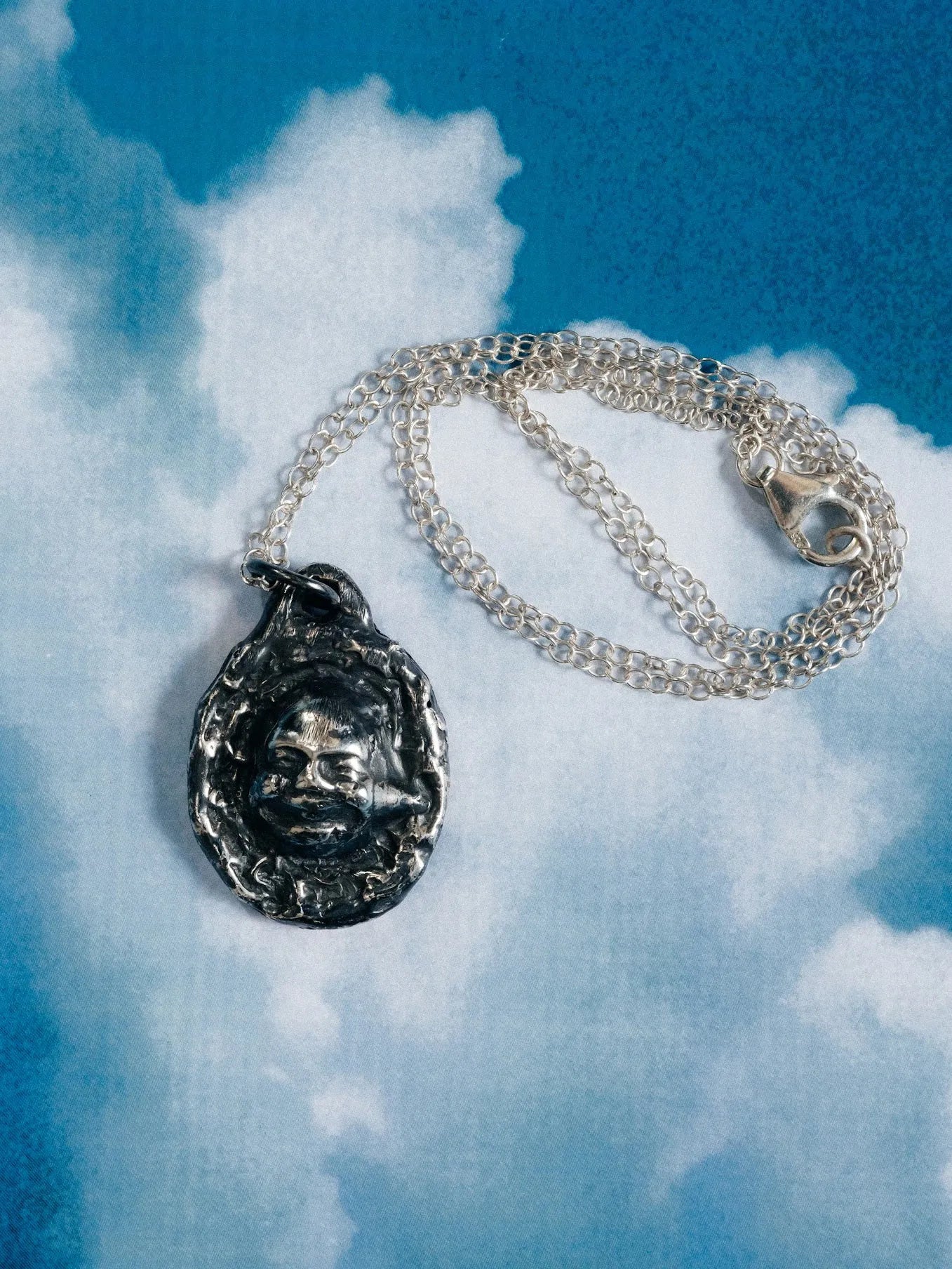 Buddha Face Necklace artisan designer necklace in premium metal, sacred symbol, different perspective