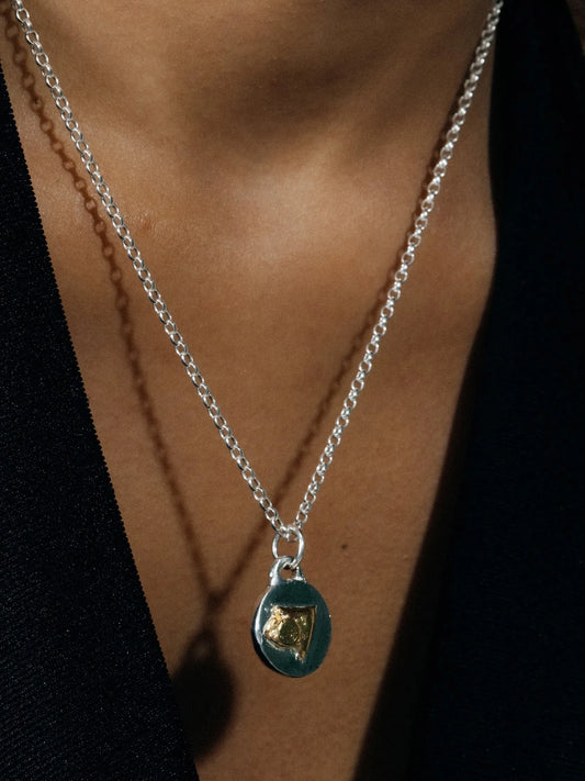 Trainage And Circle Necklace handmade luxury necklace, Patina finish, sophisticated style, close-up