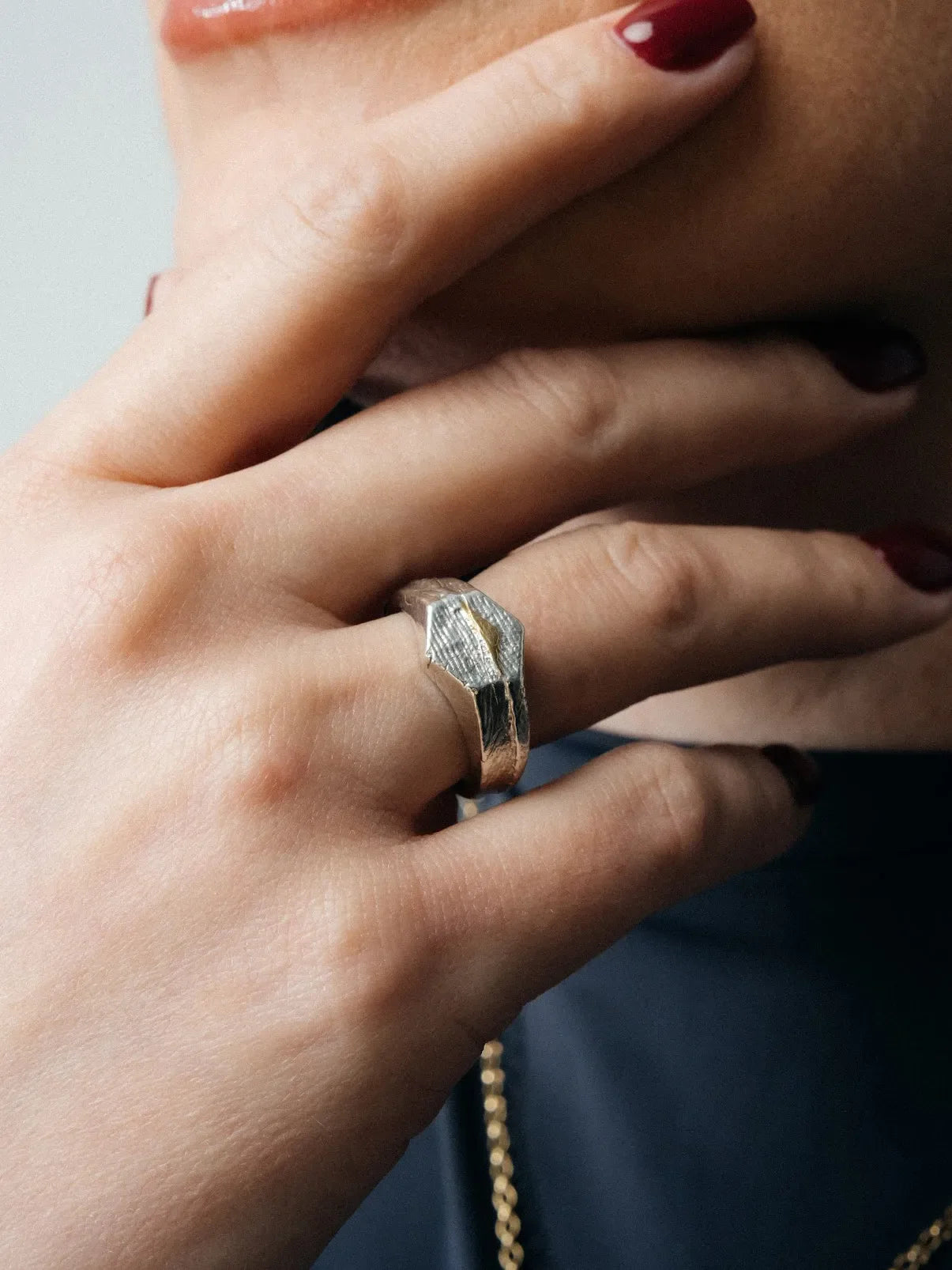 Premium Cuttle Signature Ring handmade in Sterling silver, classic design, worn view