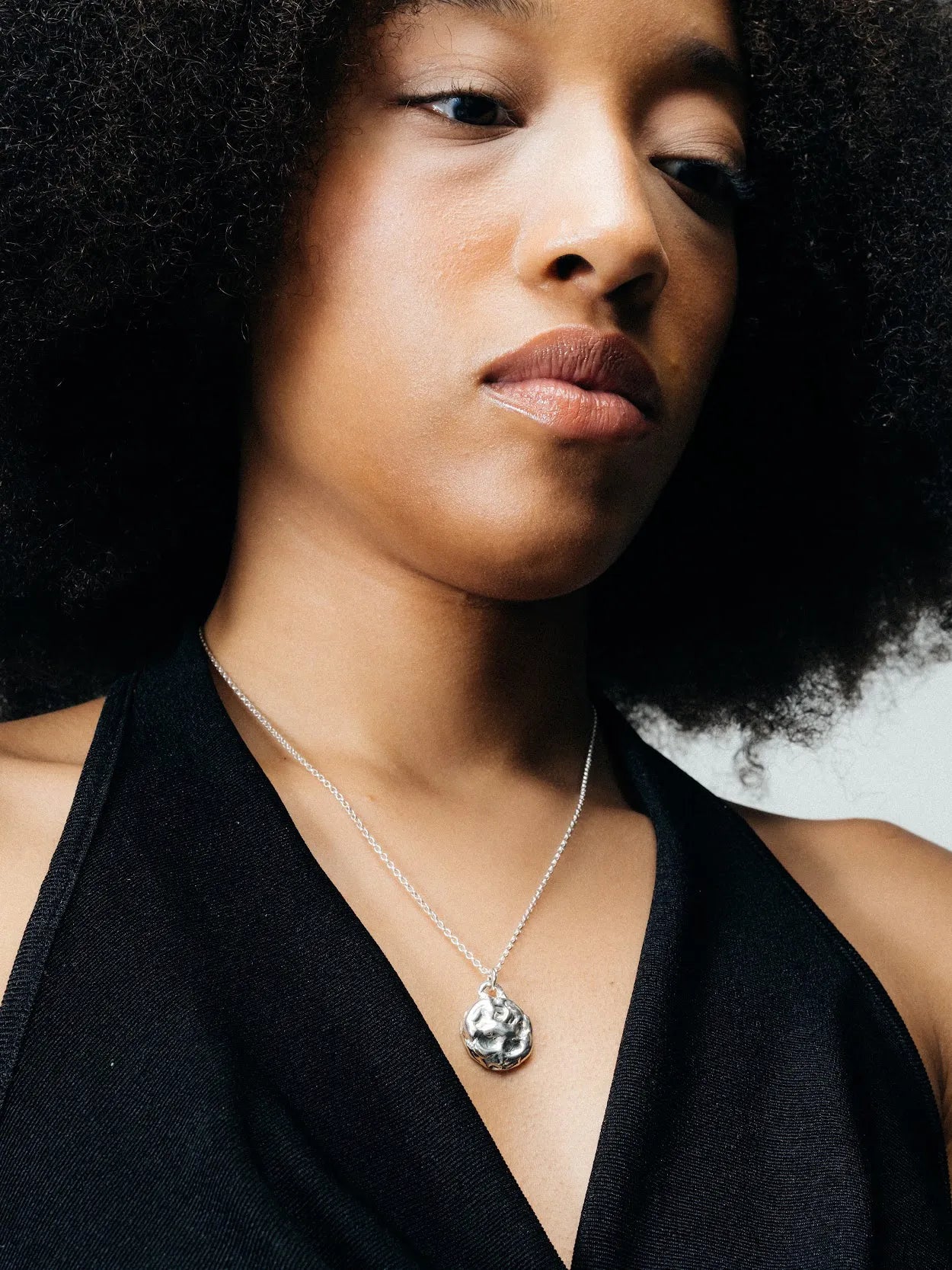 Designer Moon Pendant in premium metal, handmade jewelry, exquisite detail, alternate angle