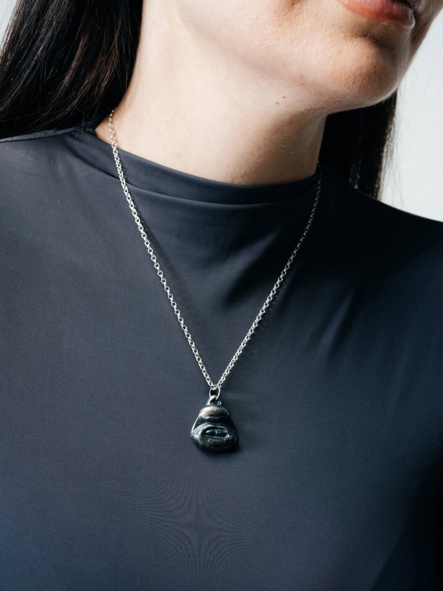 Two Teeth Necklace designer necklace in premium metal, premium quality, side view