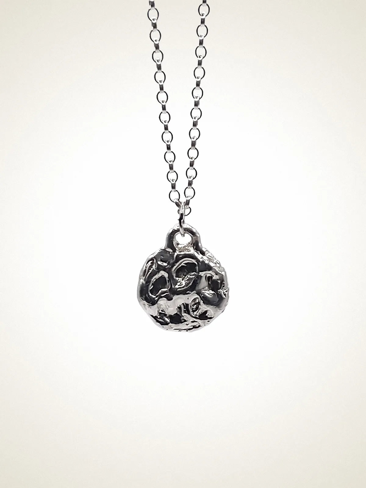 Moon Pendant handmade luxury necklace, premium metal finish, sophisticated style, close-up