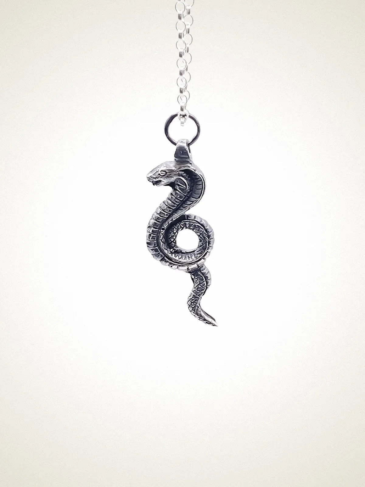 Uraeus Necklace artisan crafted necklace in premium metal, timeless style, lifestyle shot