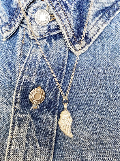 Layered Angel Wing Pendant necklaces shown on denim, guardian 11:11 gold or silver free shipping