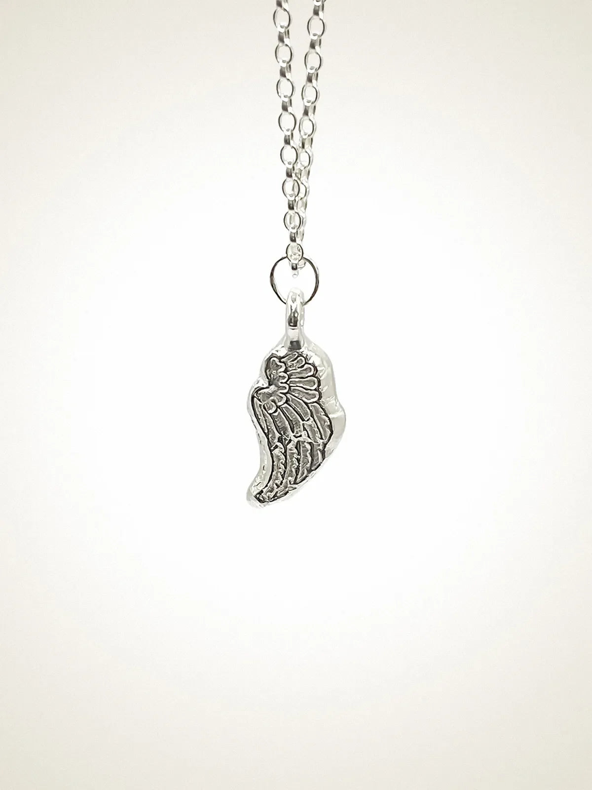 Handcrafted Angel Wing Necklace in Sterling silver, artisan jewelry, elegant design