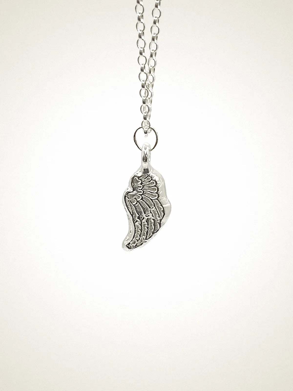 Premium Angel Wing Necklace handmade in Sterling silver, classic design, worn view