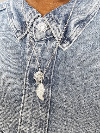 Angel Wing Pendant on denim background, guardian 11:11 gold or silver free shipping