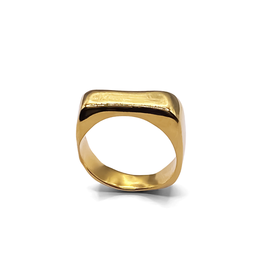 Studio view of MOCA Jewellery’s asymmetrical ring in matte gold finish