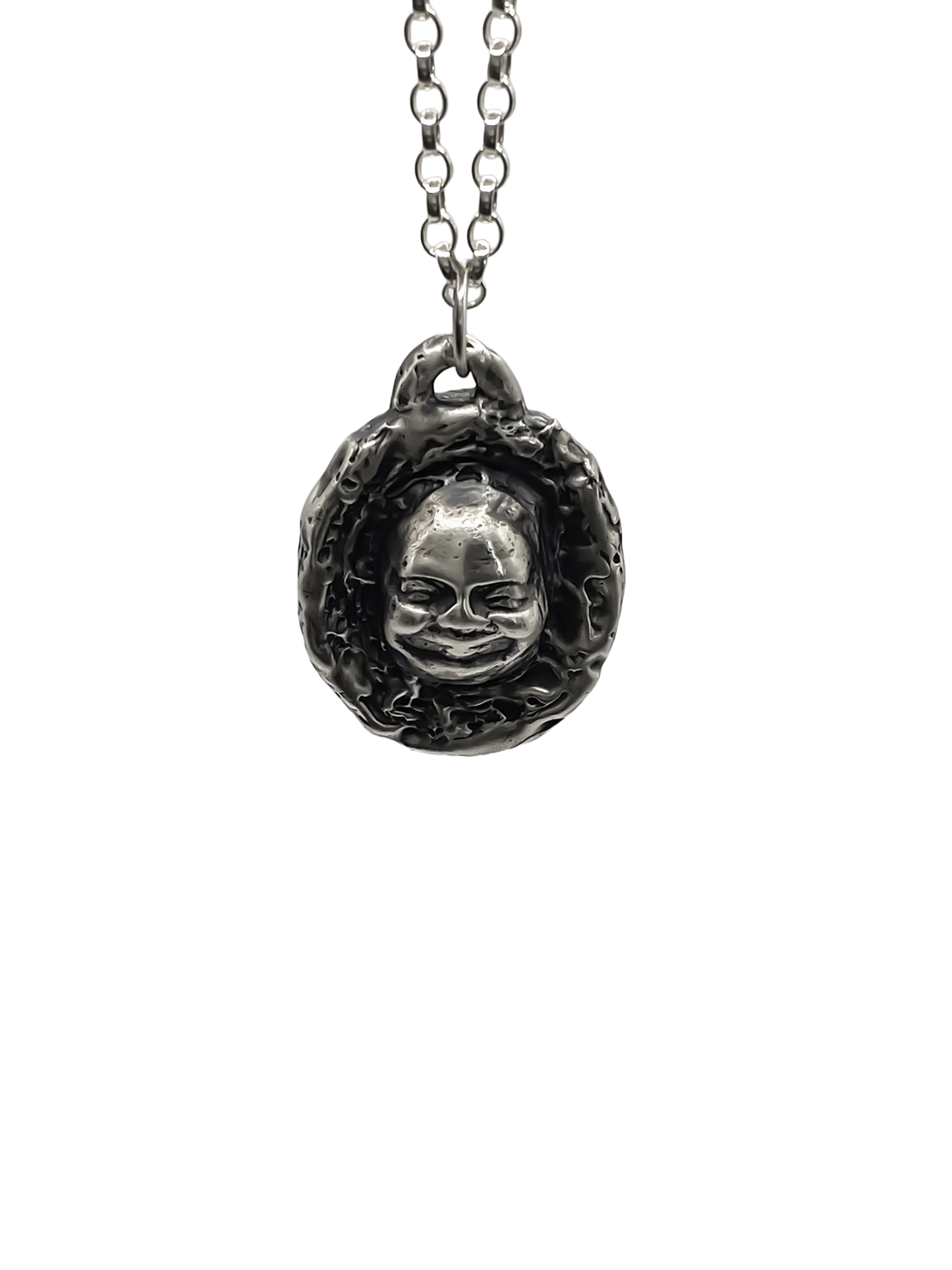 Flat studio image of Buddha Face Pendant in silver - happy buddha, spiritual, oxidised organic texture gold or silver free shipping