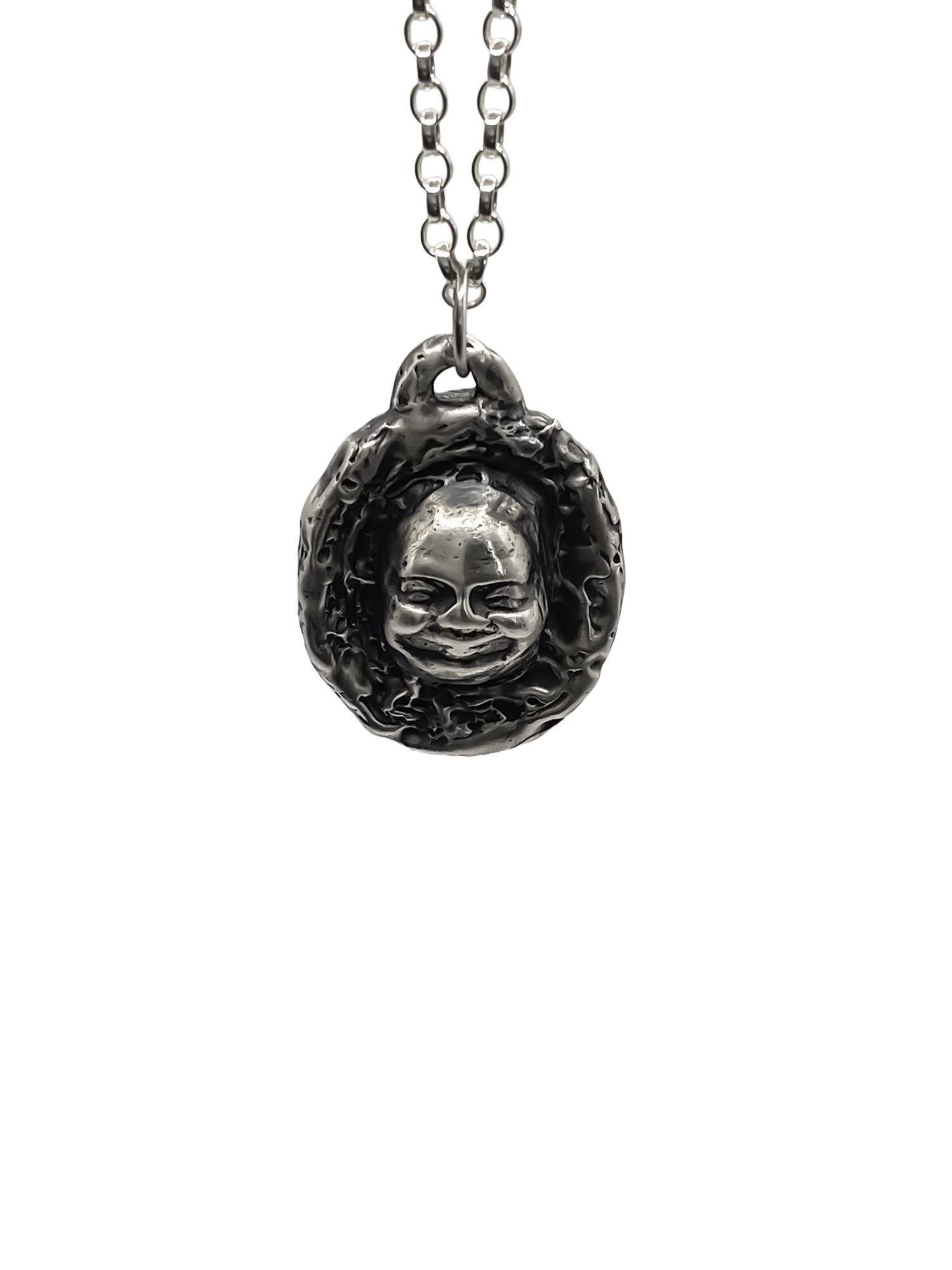 Flat studio image of Buddha Face Pendant in silver - happy buddha, spiritual, oxidised organic texture gold or silver free shipping