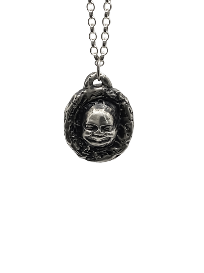Flat studio image of Buddha Face Pendant in silver - happy buddha, spiritual, oxidised organic texture gold or silver free shipping