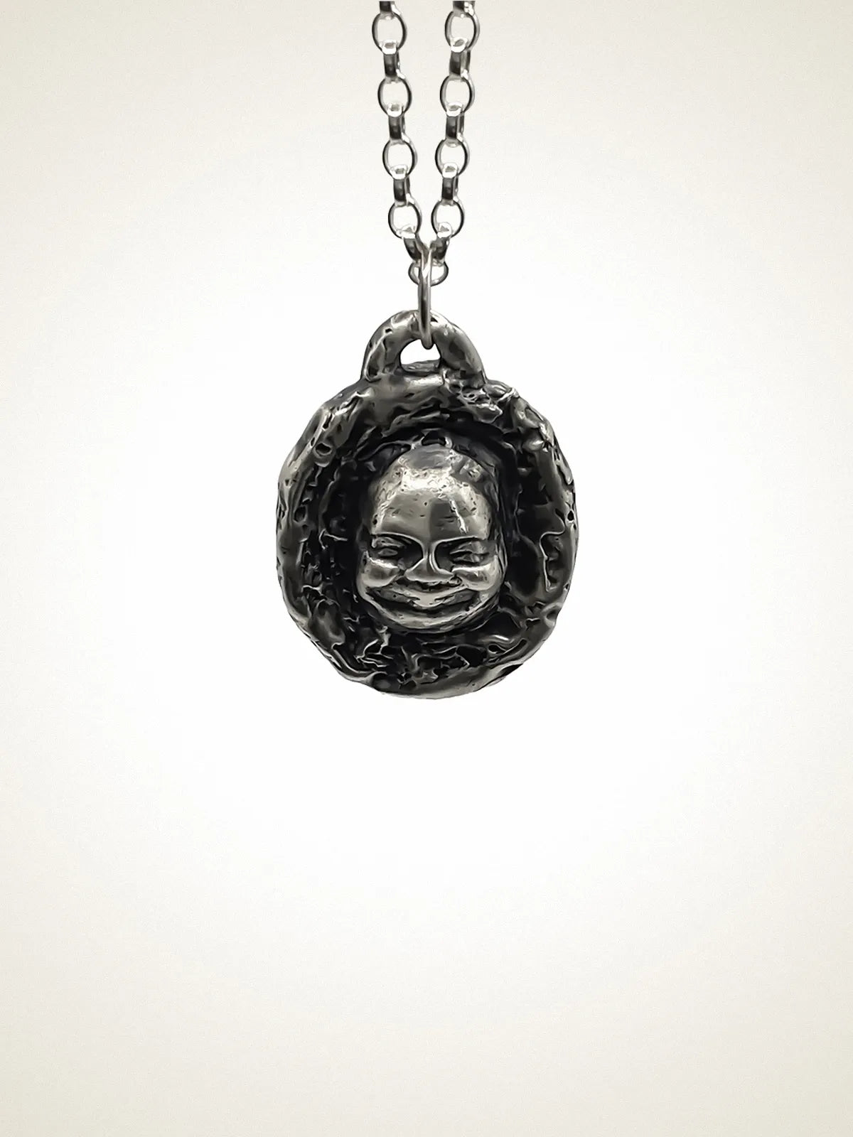 Handmade Buddha Face Necklace luxury jewelry, premium metal, mindfulness jewelry, front view