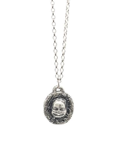 Buddha Face Pendant shown in frontal hanging view - happy buddha, spiritual, oxidised organic texture gold or silver free shipping