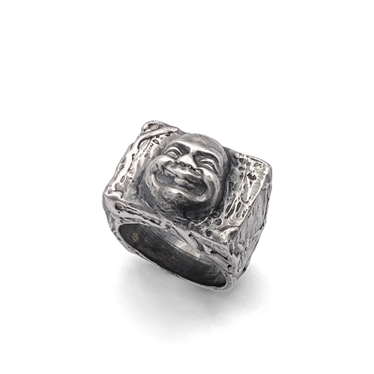Angled view with soft light hitting Buddha Signet Ring - peaceful statement piece, oxidised gold or silver, free shipping