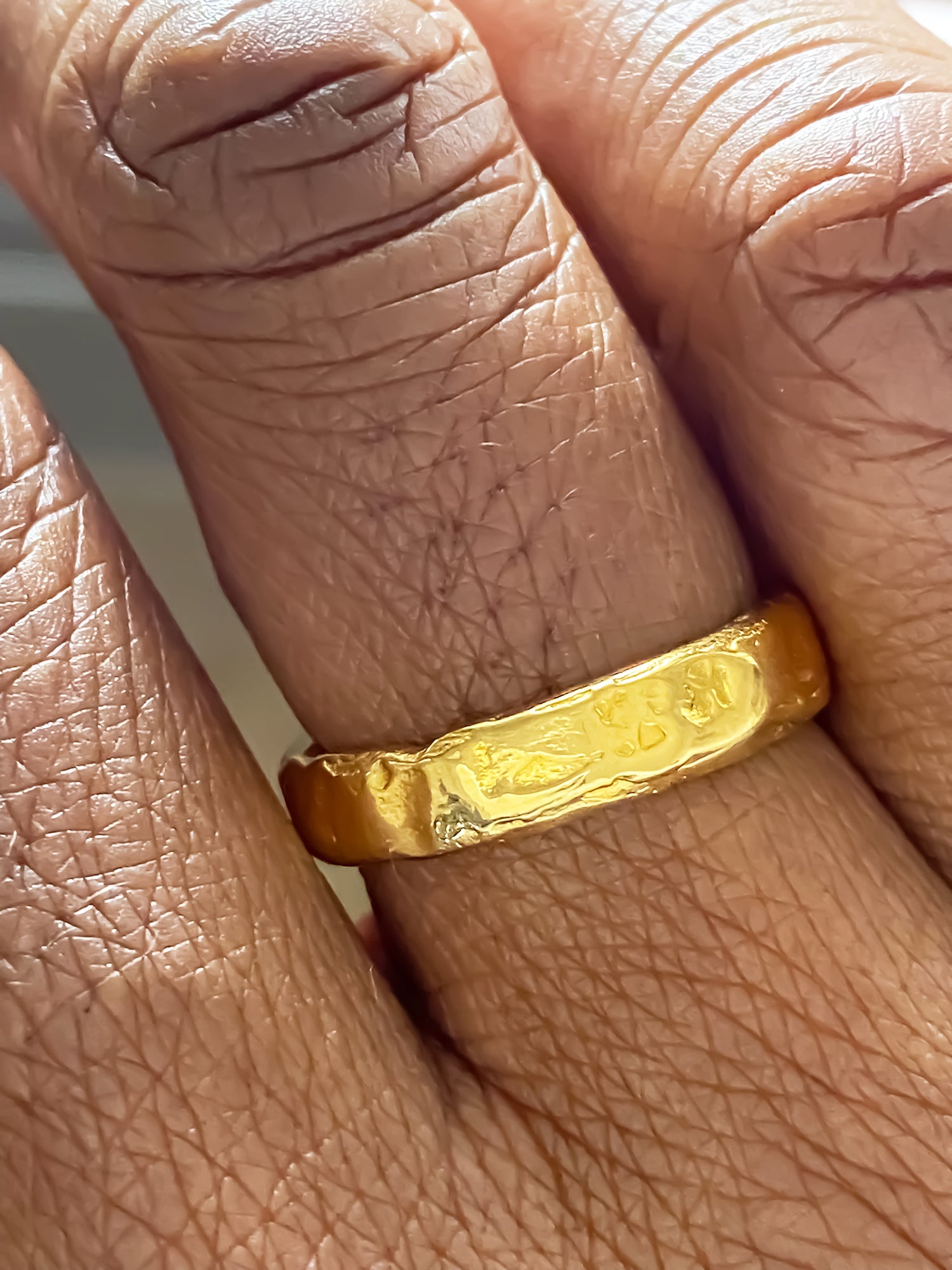Handmade Darling Textured Band Ring in gold, featuring a delicate hammered finish. Minimal design by MOCA Jewellery.