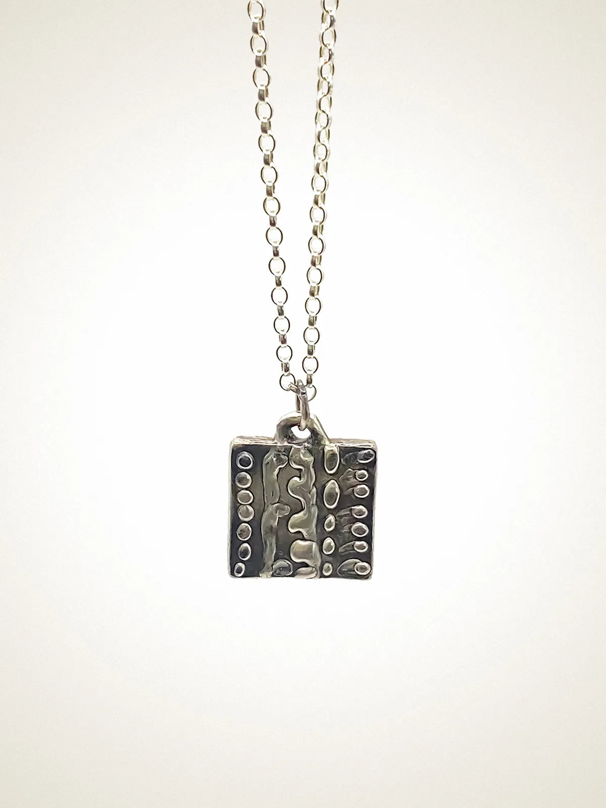 Dotty Necklace designer necklace in premium metal, premium quality, side view