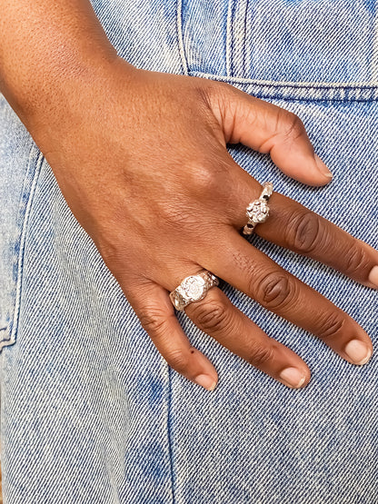 Blue background hand modelled with Eclipse Cutout Ring - textured band white and black gemstones gold or silver free shipping